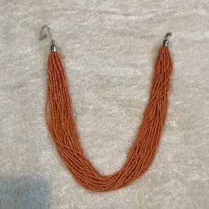 Orange strand beaded necklace